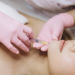 How can cosmetic injectables create a balanced facial look