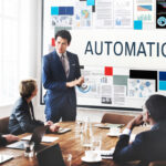 Business team discussing AI business process automation during a presentation on customer service and workflow efficiency.